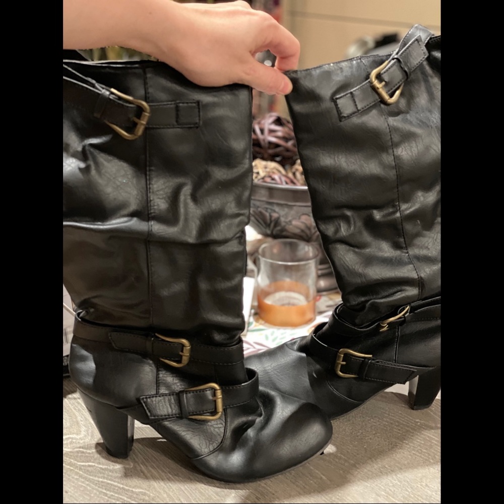 Tall black heeled boots